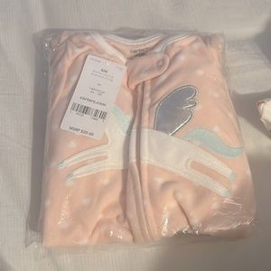 This is a really cute pink brand new onesie ❤️